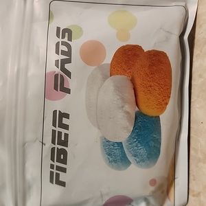 Fiber pads for cellulite massager